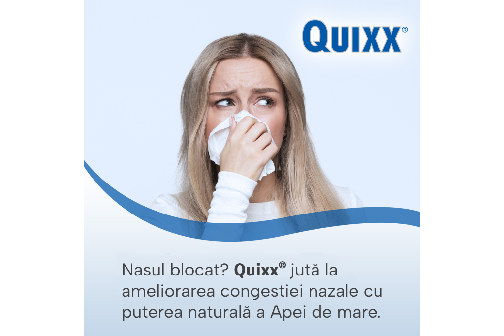 Femeie care își acoperă nasul cu un șervețel.